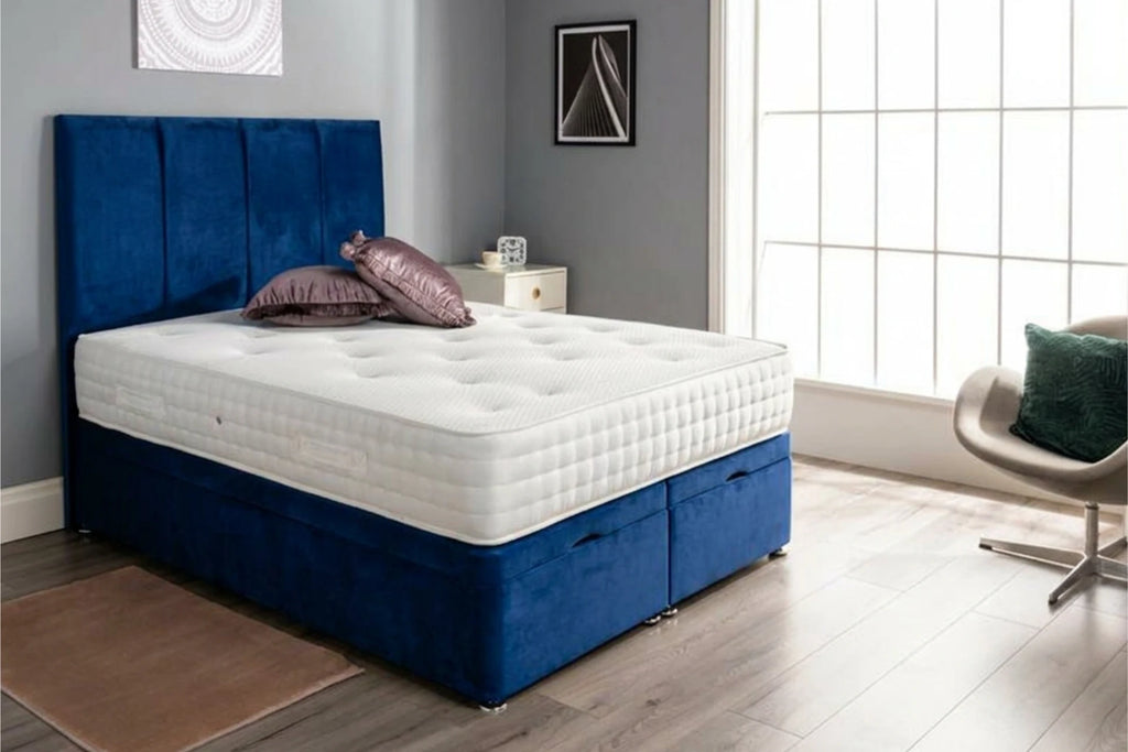 Ottoman end lift storage bed in plush marine blue with tall headboard and mattress